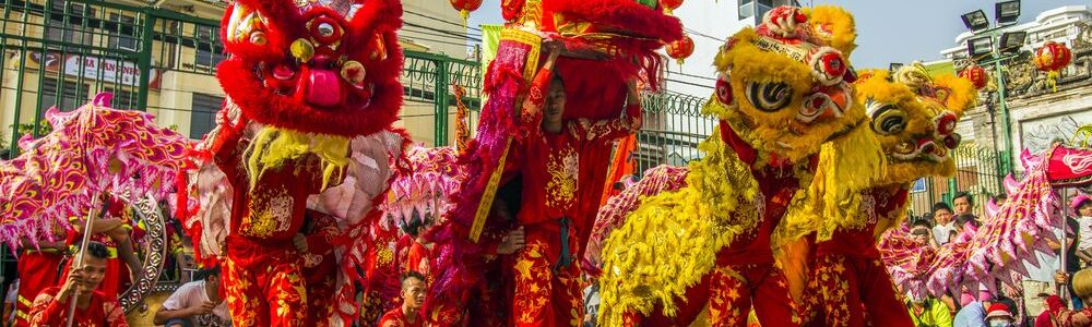 chinese festival with dragon dance being performed