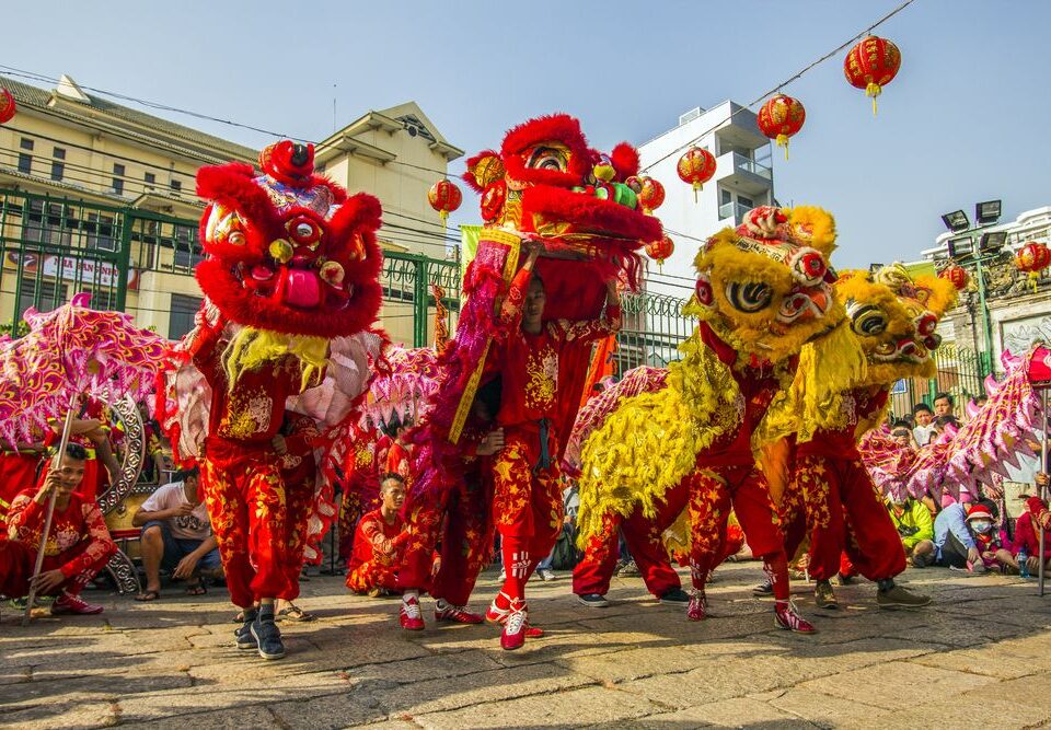 chinese festival with dragon dance being performed