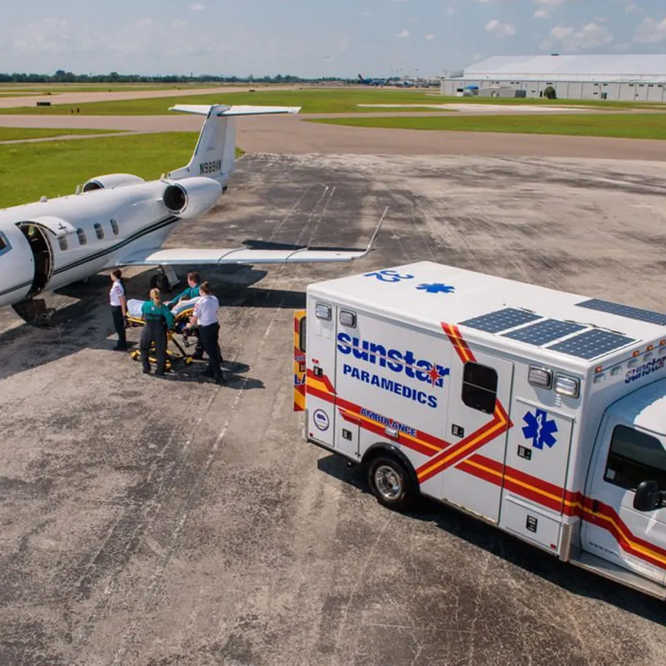 ambulance and jet transporting a patient